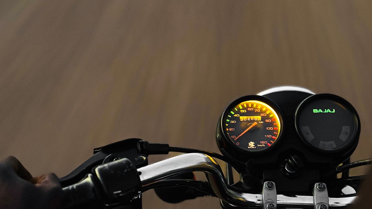 Motorcycle riding on an open road, illustrating Florida lane splitting law