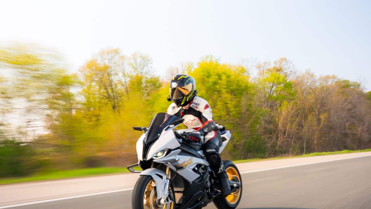 Motorcyclist riding on a highway, illustrating Florida motorcycle insurance
