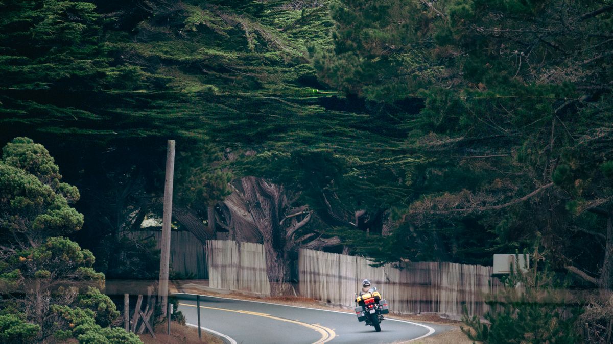 Motorcycle on a winding road, illustrating motorcycle loan rate comparison