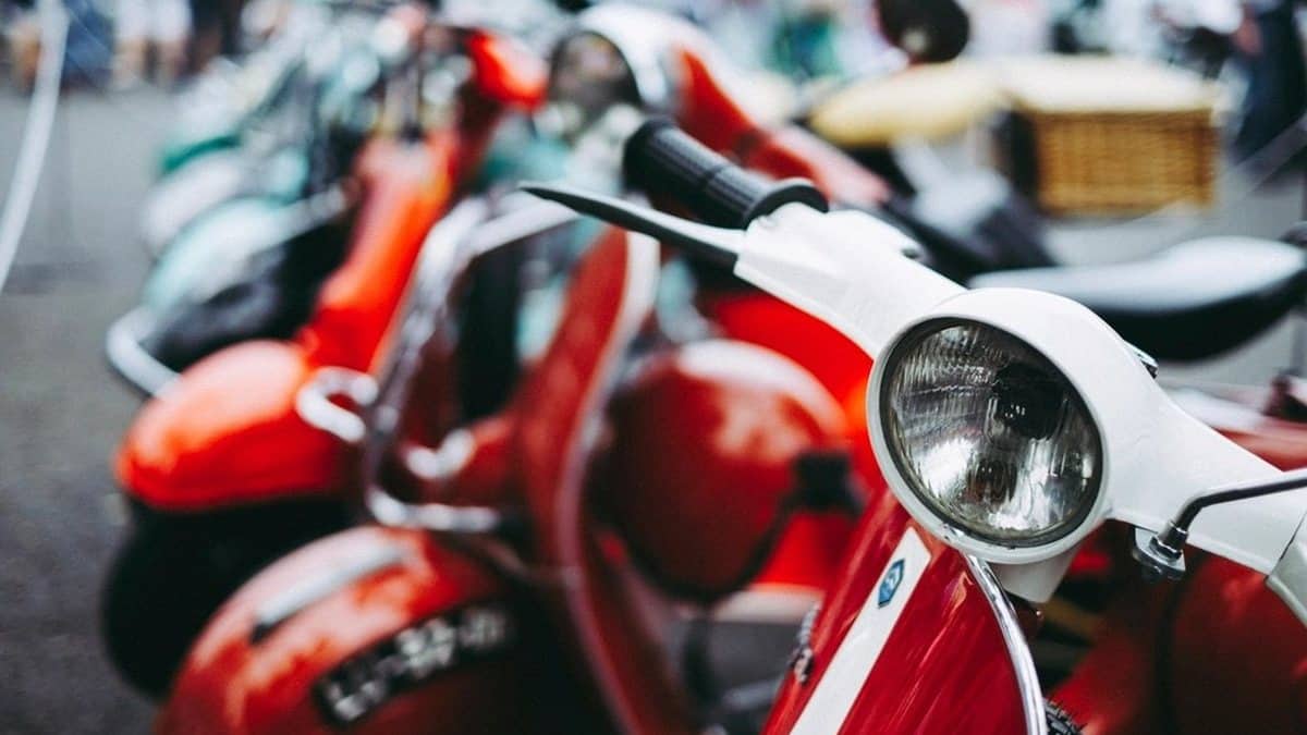 Row of scooters parked in a line