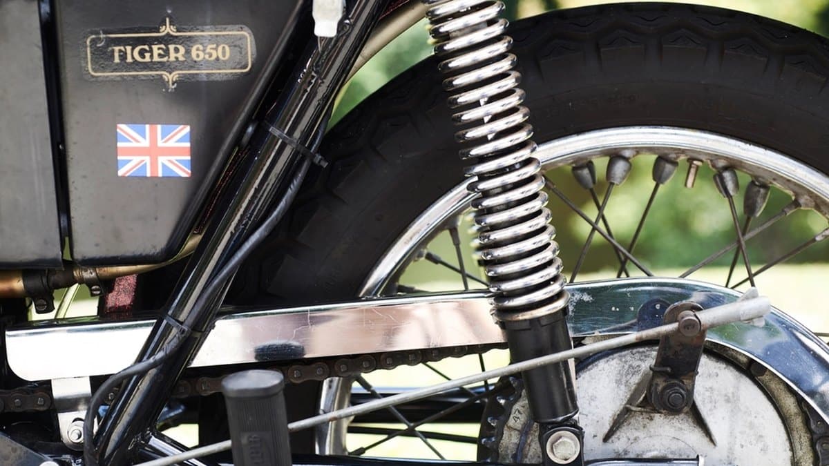 Close-up of a motorcycle final drive chain and sprocket