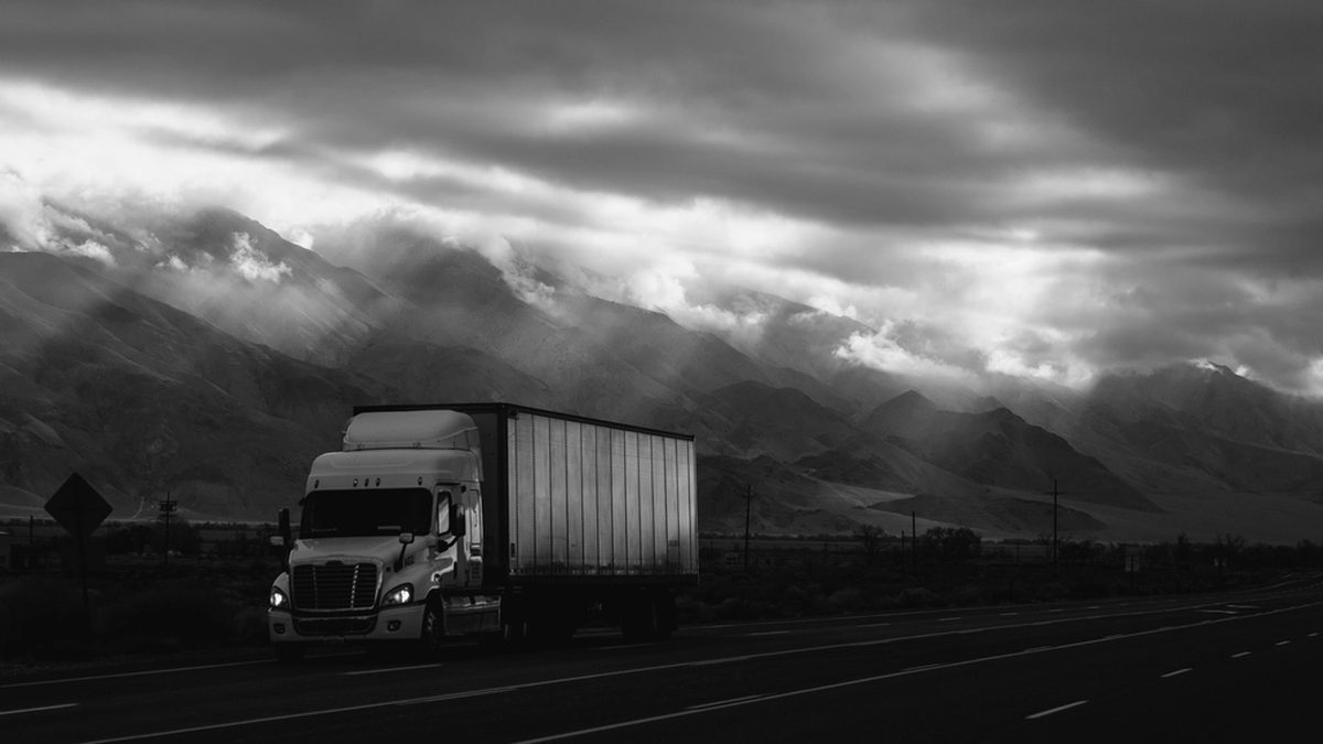 Open American highway of the kind a motorcycle crosses when shipped cross country